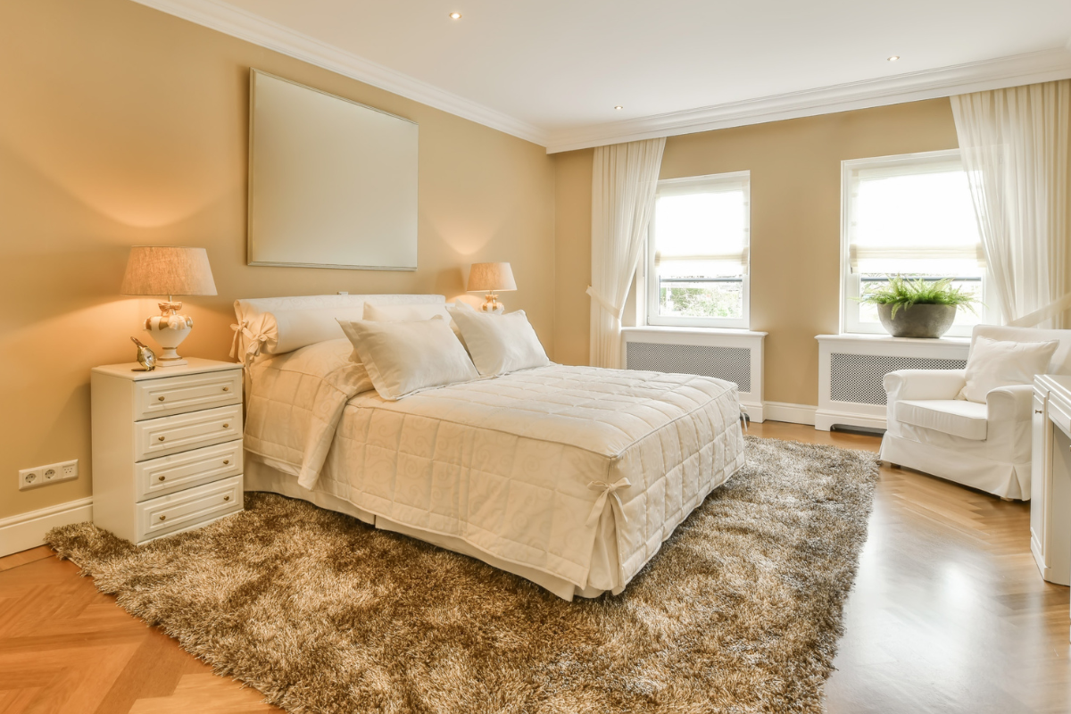 How to Place a Rug Under a Bed